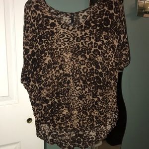 Cheetah print blouse.